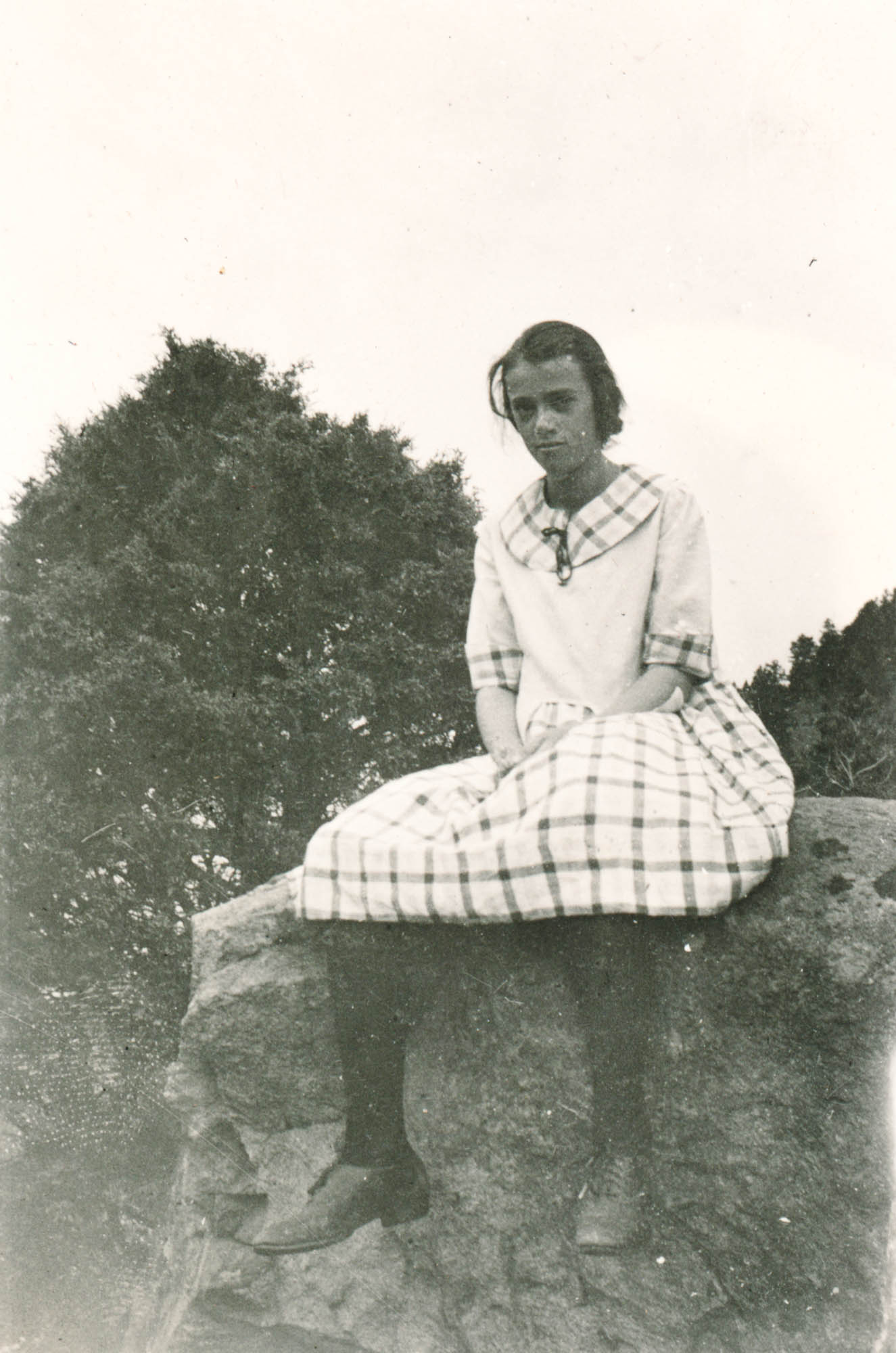 Idlewild Lodge - idlewildlodge.github.io - Circa 1921 - Elizabeth Dauth Sitting On Rock