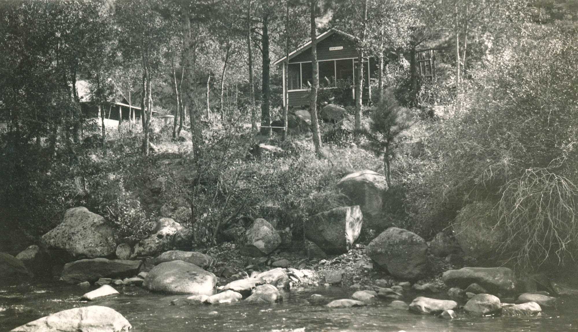 Idlewild Lodge - idlewildlodge.github.io - Circa 1930 - DAMFINO Facade taken from accross the river
